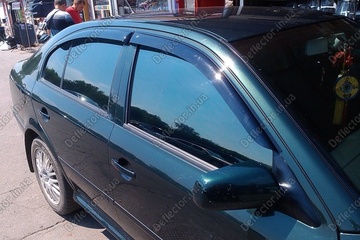 Ветровики на окна - дефлекторы окон авто Skoda Octavia Tour