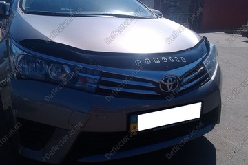 Отбойник на капот - мухобойка Toyota Corolla